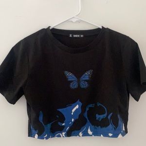 This is a butterfly crop top w/ waves !